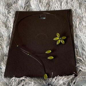 Elegant Black Necklace with Green Accents